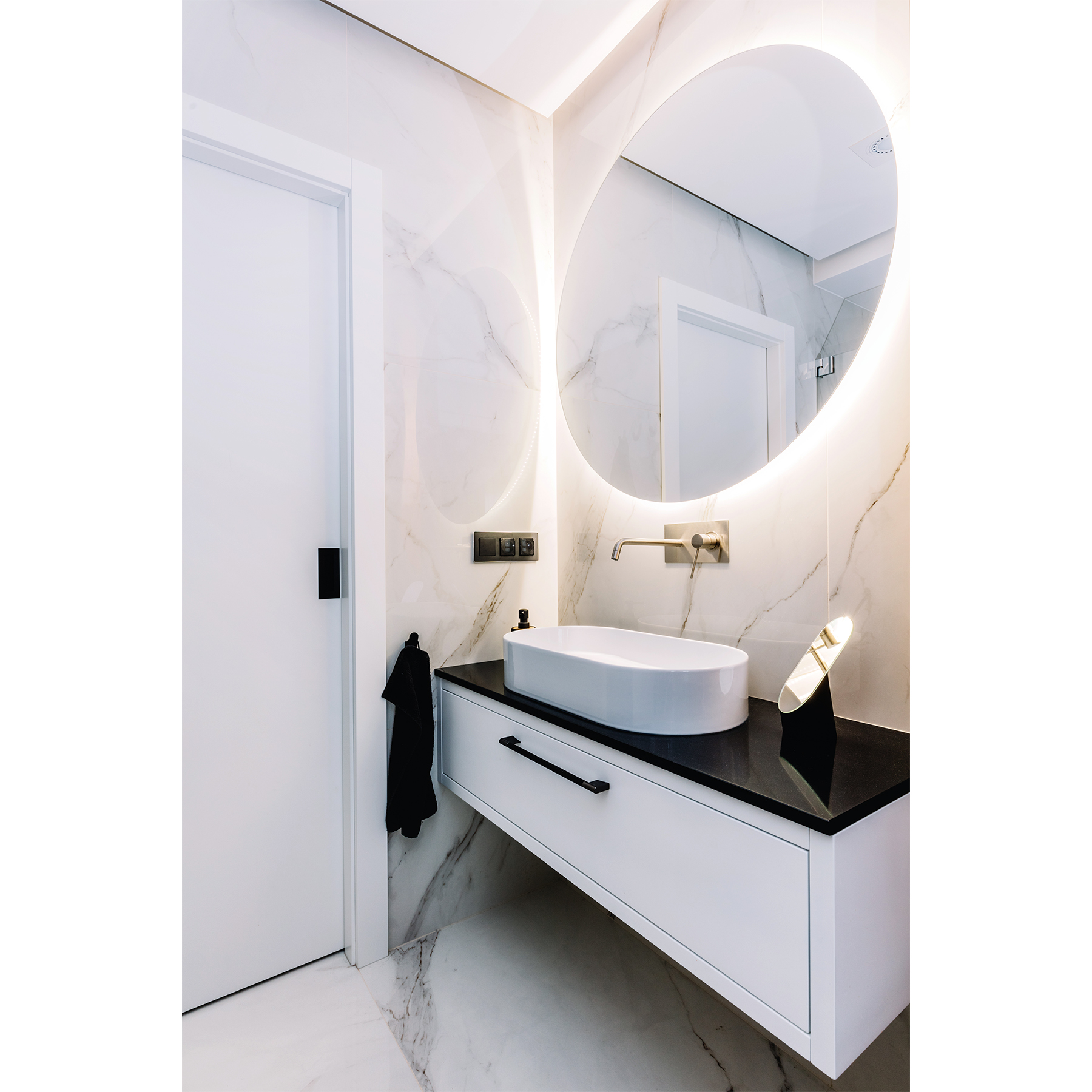 https://www.twowaymirrors.com/wp-content/uploads/2020/11/LED-Lights-Placed-Behind-A-Custom-Mirror.jpg