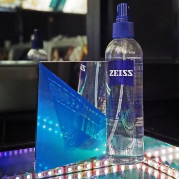 The glass first surface mirror is sitting next to the zeiss cleaner, the cleaning solution we recommend for gentle cleansing.
